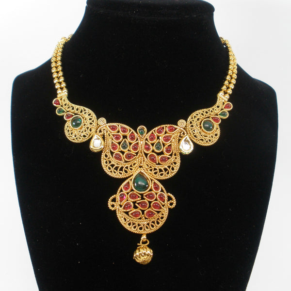 gold finish necklace set with kemp like stones