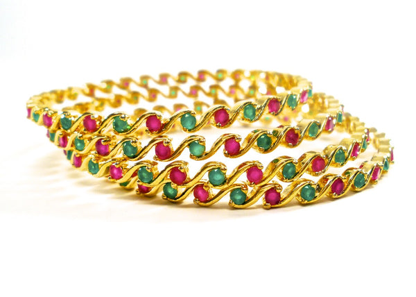 set of traditional ruby and emerald bangles