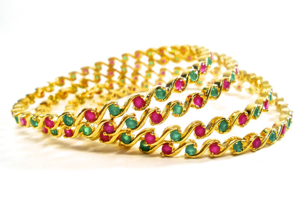 set of traditional ruby and emerald bangles