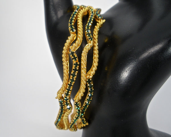 wavy bangles with colored stones