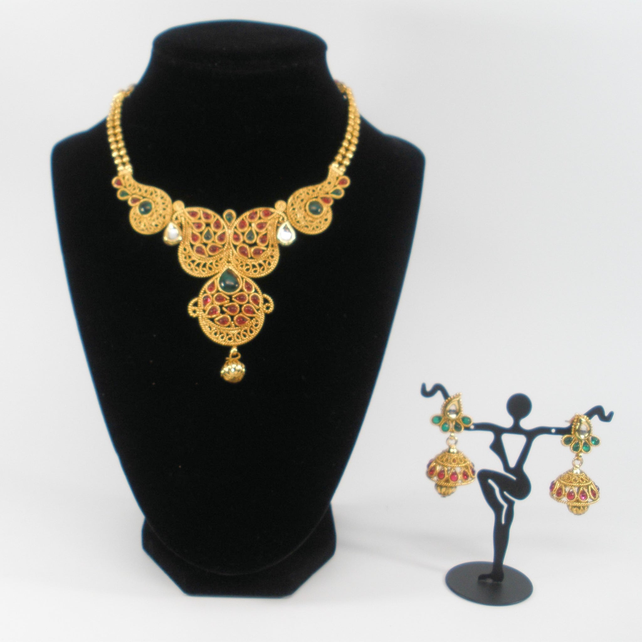 gold finish necklace set with kemp like stones