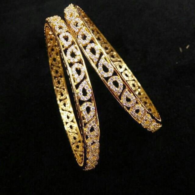 white stone bangle pair